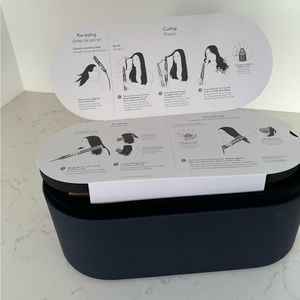 Airwrap Multi-Styler Complete. most attachments not used. warranty included.